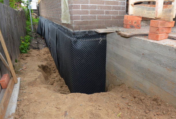 Happy homeowners after waterproofing job in Walkersville
